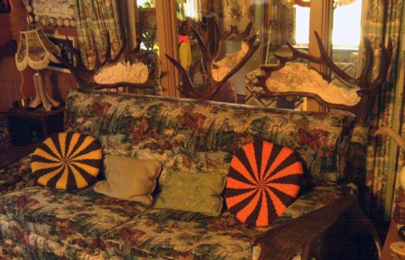 couch and antlers Inside Bill Steckman's cabin