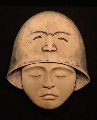 'Bell-Faced Helmet' (carved and and coloured antler) by Maureen Morris