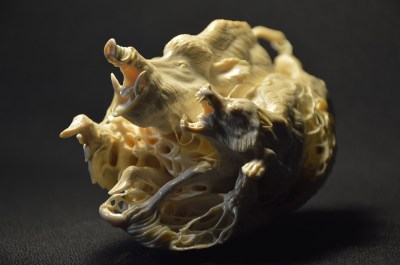 Boar and Wolf (mammoth tusk) by Dmitry Gorodetsky