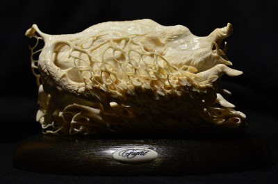 Boar and Wolf (mammoth tusk) by Dmitry Gorodetsky
