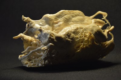 Boar and Wolf (mammoth tusk) by Dmitry Gorodetsky