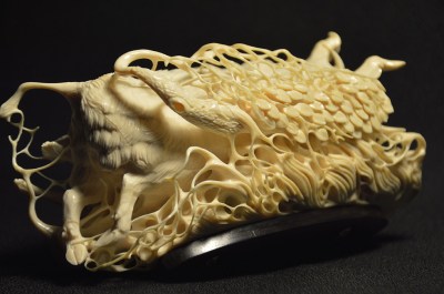 Boar and Wolf (mammoth tusk) by Dmitry Gorodetsky
