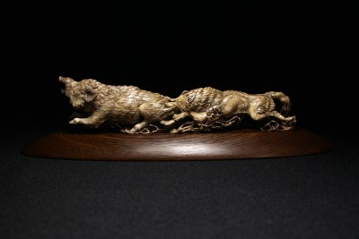 'Wild Boar and Wolf,' by Dmitry Gorodetsky (carved and stained mammoth tusk - 22cm x 8cm)