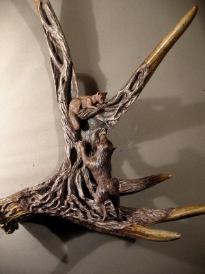 'Martin and Laika' by Dmitry Gorodetsky (carved and stained moose antler and wood)