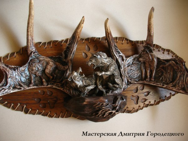9. 'Wolf Fight' by Dmitry Gorodetsky (carved and stained moose antler and wood)