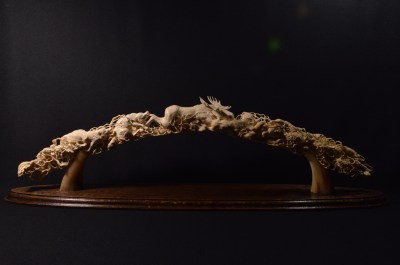 Moose and Wolves (mammoth tusk) by Dmitry Gorodetsky