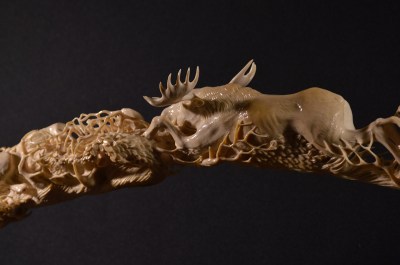 Moose and Wolves (mammoth tusk) by Dmitry Gorodetsky