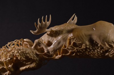 Moose and Wolves (mammoth tusk) by Dmitry Gorodetsky