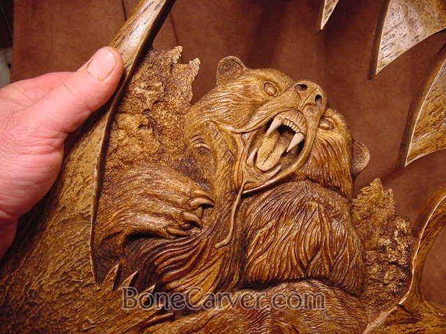 Bear carved into moose antler, by Jack Brown
